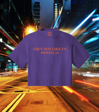 Load image into Gallery viewer, They Not Like Us” Phoenix AZ Purple and Orange Women’s Crop Tee
